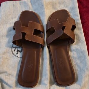 Hermes La Maison Brown Flats